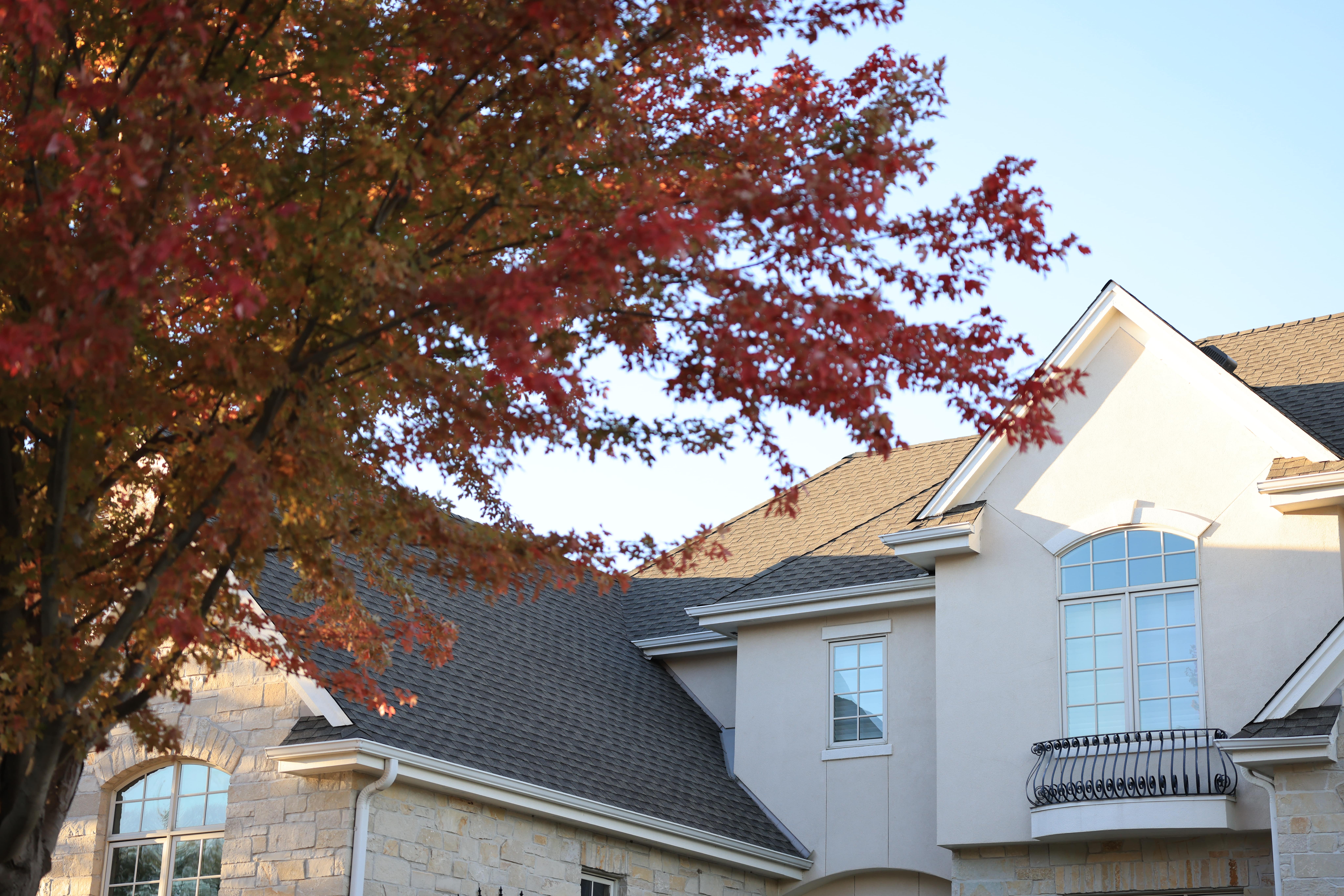 Large luxury home with new Timberline HDZ asphalt shingle roof replacement in Hartland Wisconsin