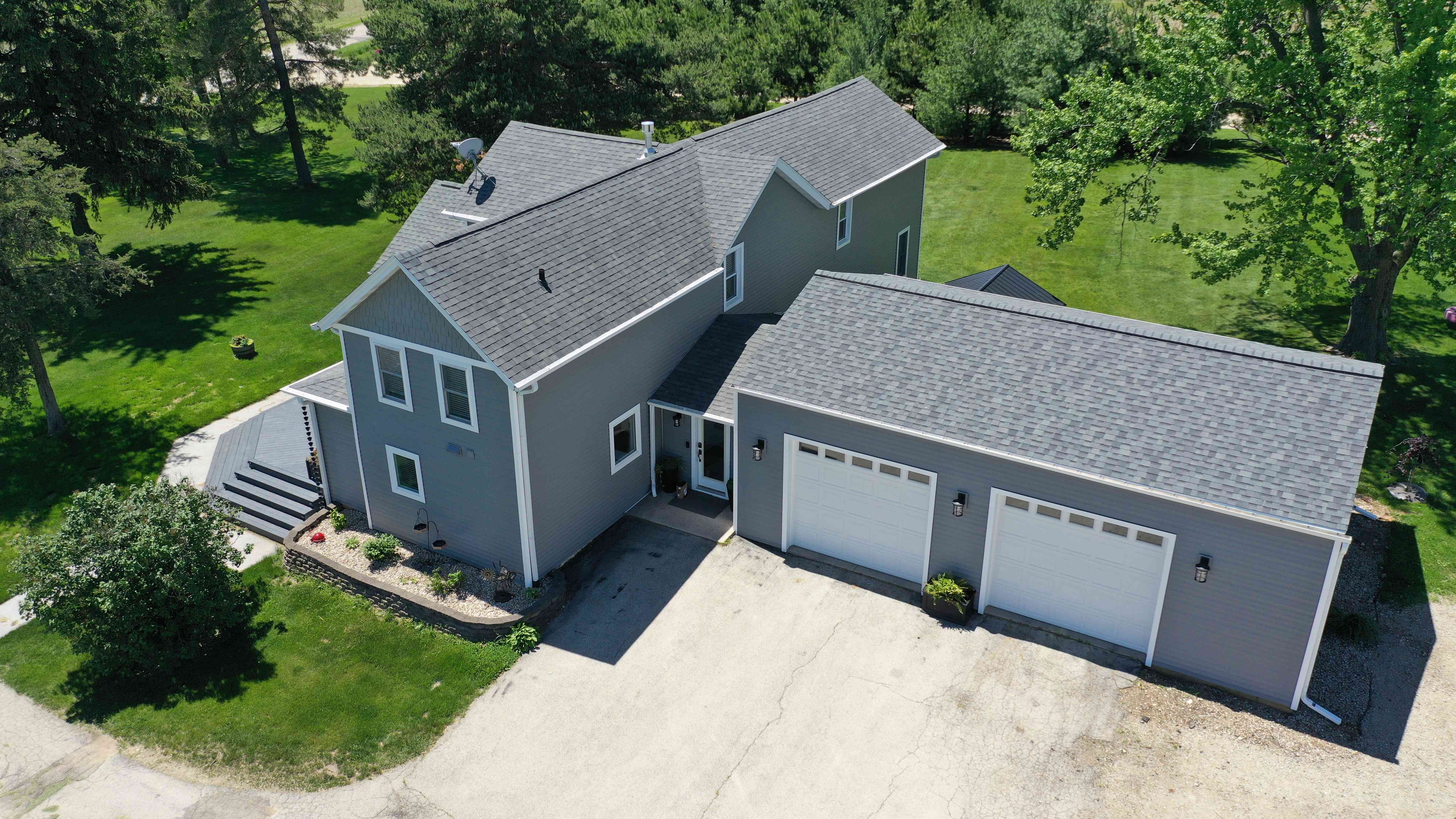 A large two car garage with new mastic siding from ridge top exteriors