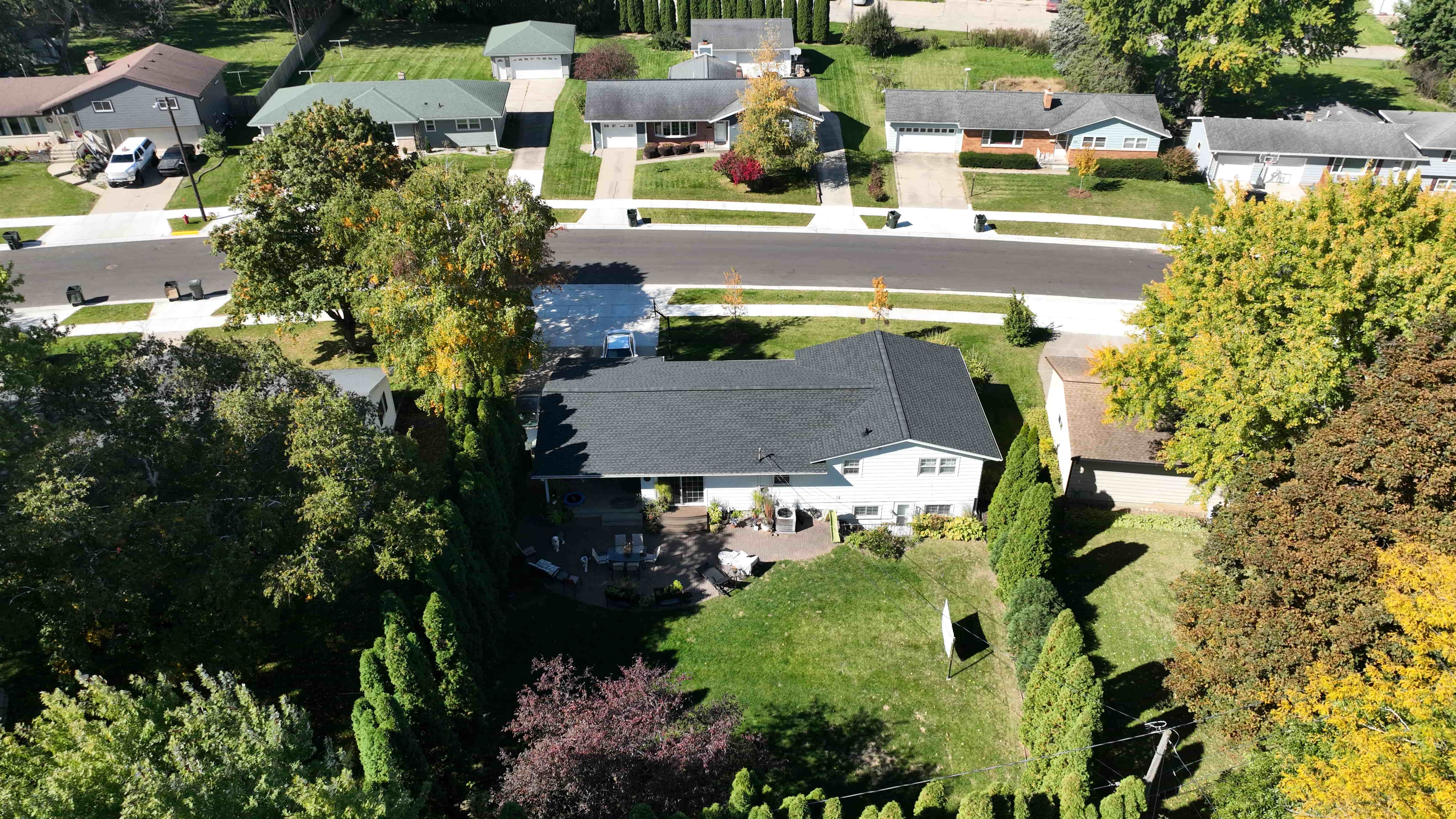 Drone view of completed roof replacement highlighting upgraded ventilation and overall roof layout
