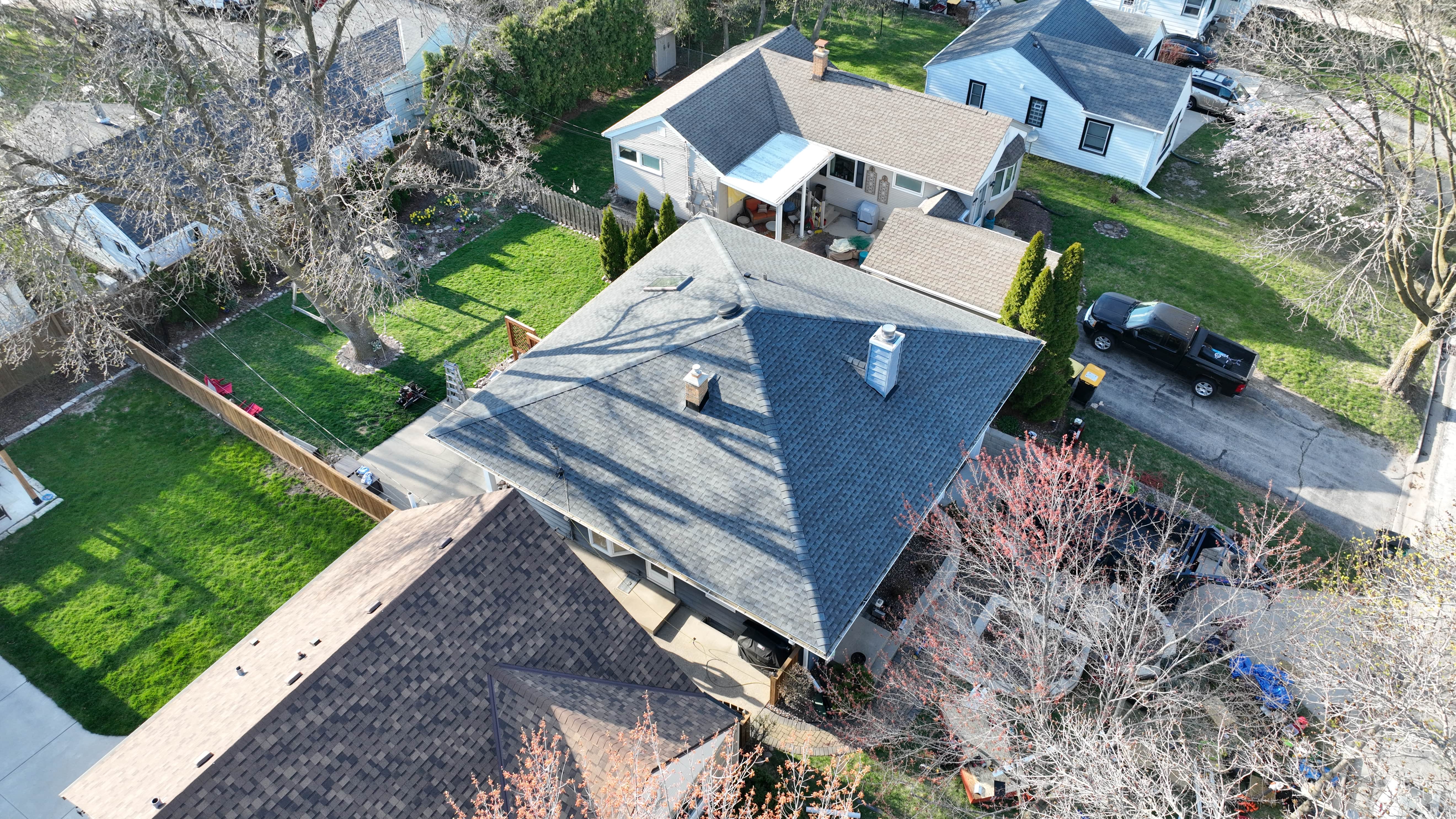 Milwaukee roof replacement completed under GAF Golden Pledge Warranty by Ridge Top Exteriors using Timberline HDZ shingles in Pewter Gray
